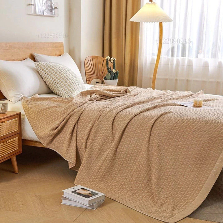 Beige Cotton Waffle Bed Blanket draped in bedroom lifestyle
