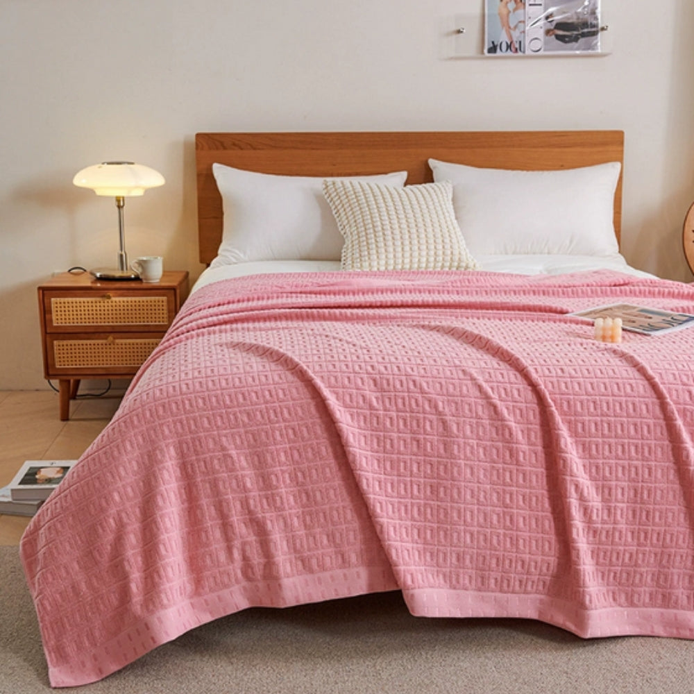 Pink Lightweight Cotton Waffle Bed Blanket on bed front view