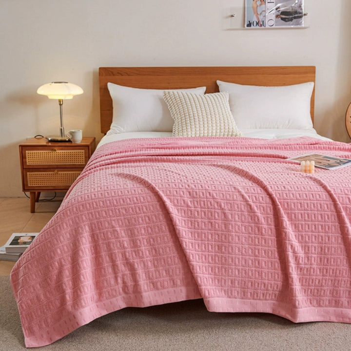 Pink Lightweight Cotton Waffle Bed Blanket on bed front view