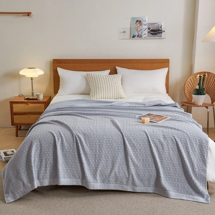 Gray Lightweight Cotton Waffle Bed Blanket on bed front view