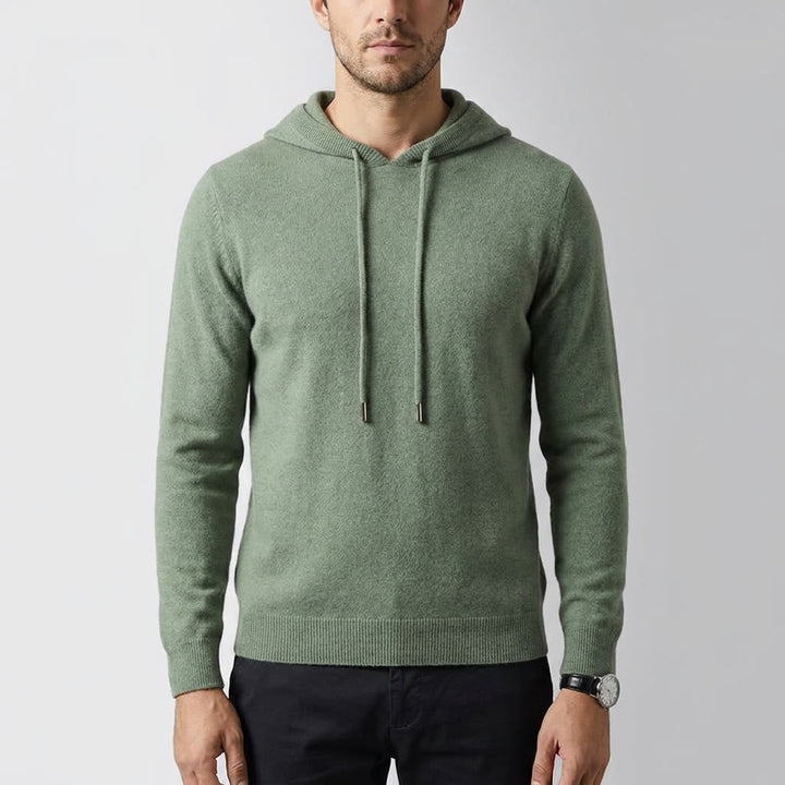 Green Merino Wool Pullover Hoodie worn studio view