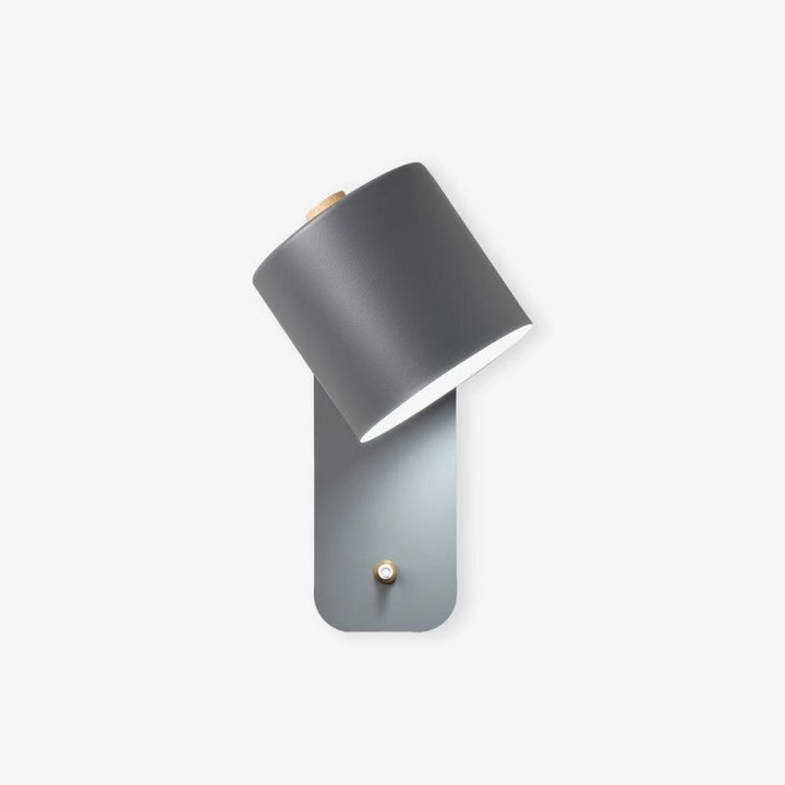 Black Macaron Swivel Beam Sconce on wall
