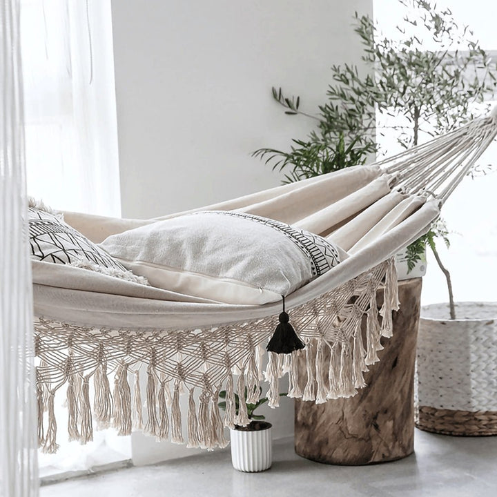Handwoven Cotton Macrame Hammock hanging outdoors