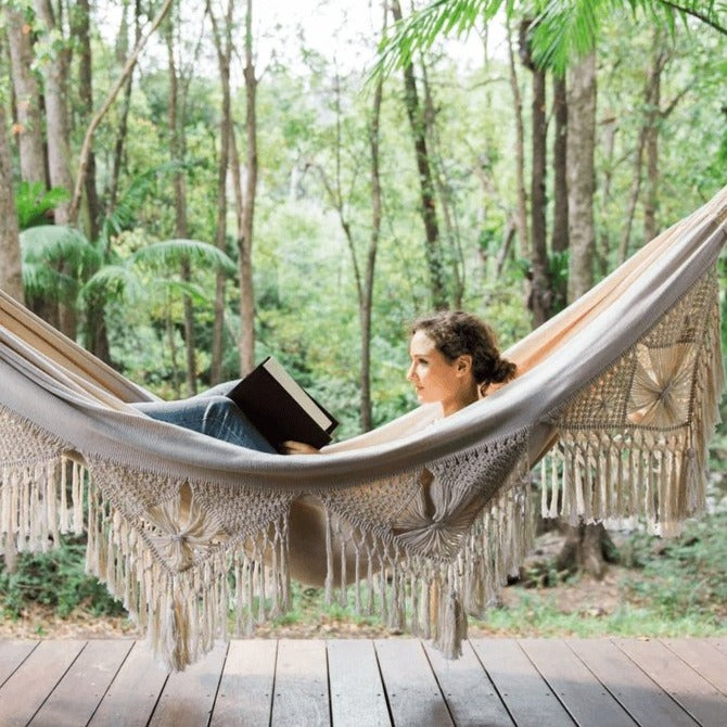 Handwoven Cotton Macrame Hammock on patio