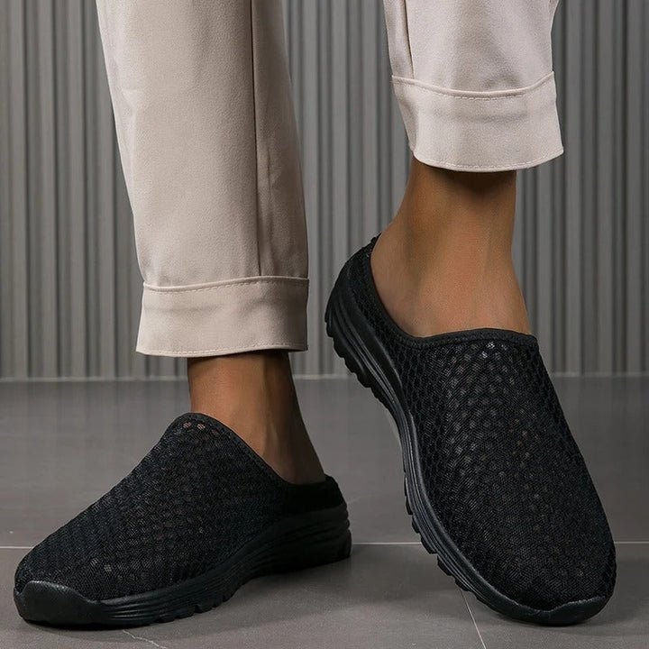 Black Orthopedic Mesh Slip-On Sneakers worn lifestyle