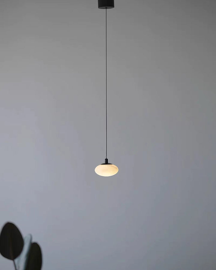 Mini Mushroom Dome Pendant lit at night