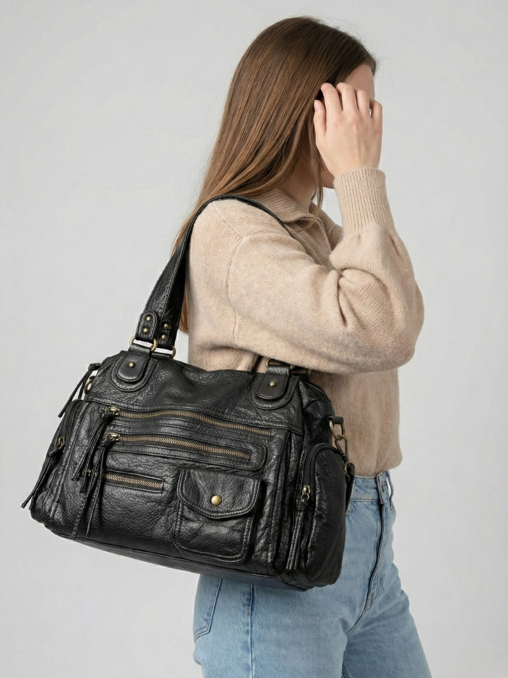 Black Multi-Pocket Vegan Leather Shoulder Bag worn on shoulder
