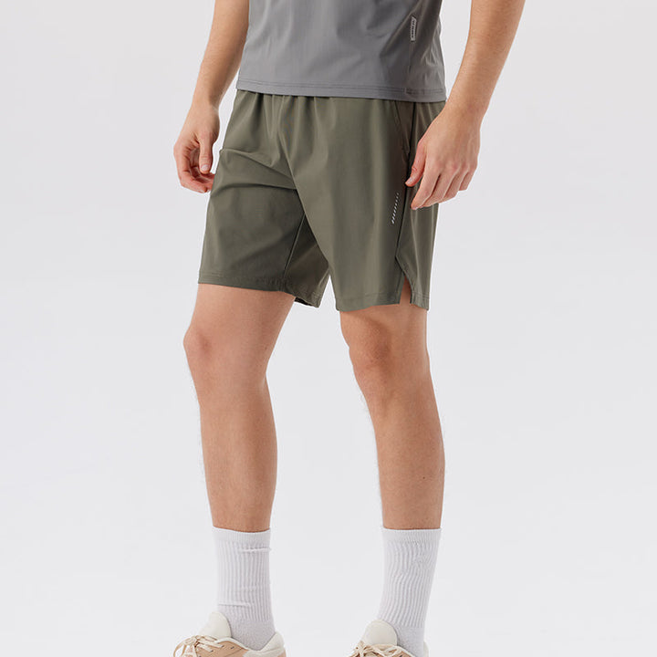 Green Nylon Stretch Athletic Shorts worn full length