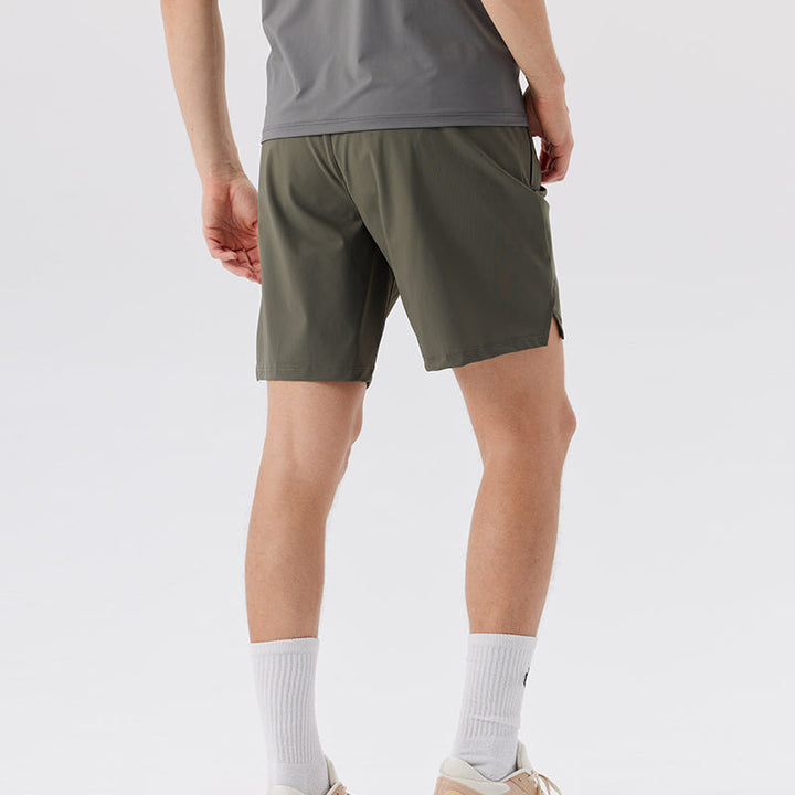 Green Nylon Stretch Athletic Shorts worn angled view