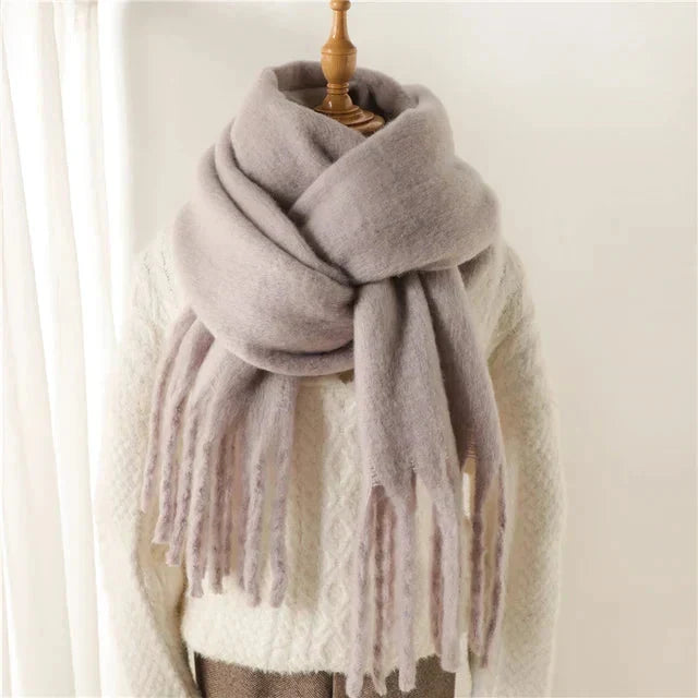 Beige Oversized Wool Blend Fringe Scarf on mannequin