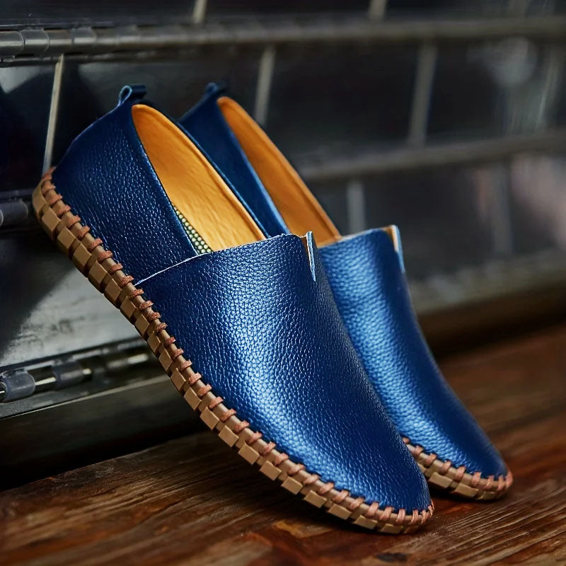Navy Blue Pebbled Leather Loafers pair on display stand