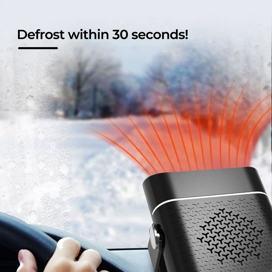 Portable car heater defrosting a windscreen
