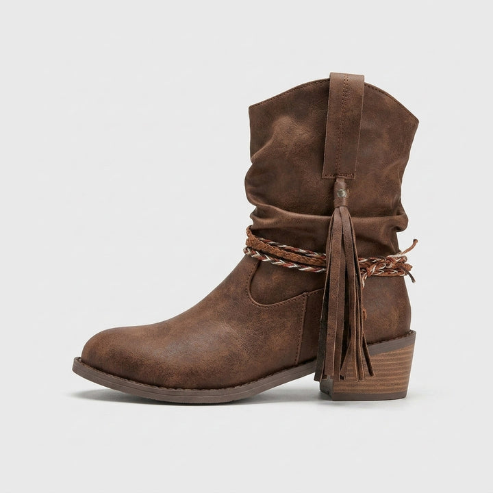Brown pull-on slouch boot side view with tassel detail