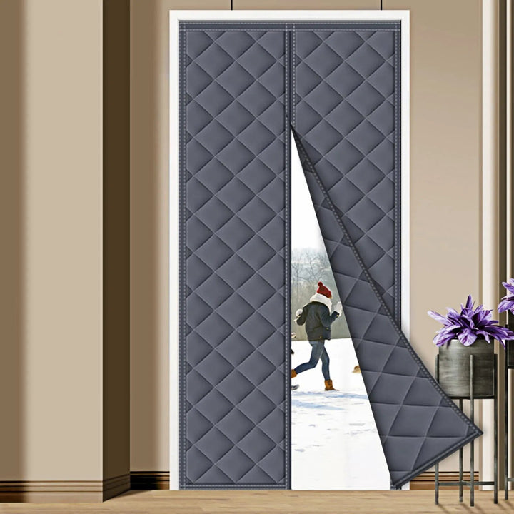 Gray Quilted Magnetic Door Insulation Curtain fitted to a door frame