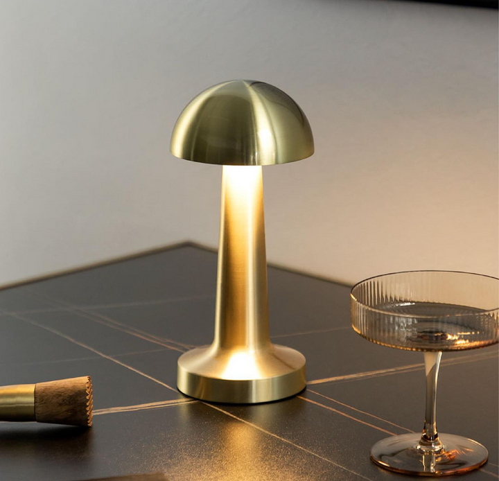 Gold Rechargeable Cordless Mushroom Table Lamp on table
