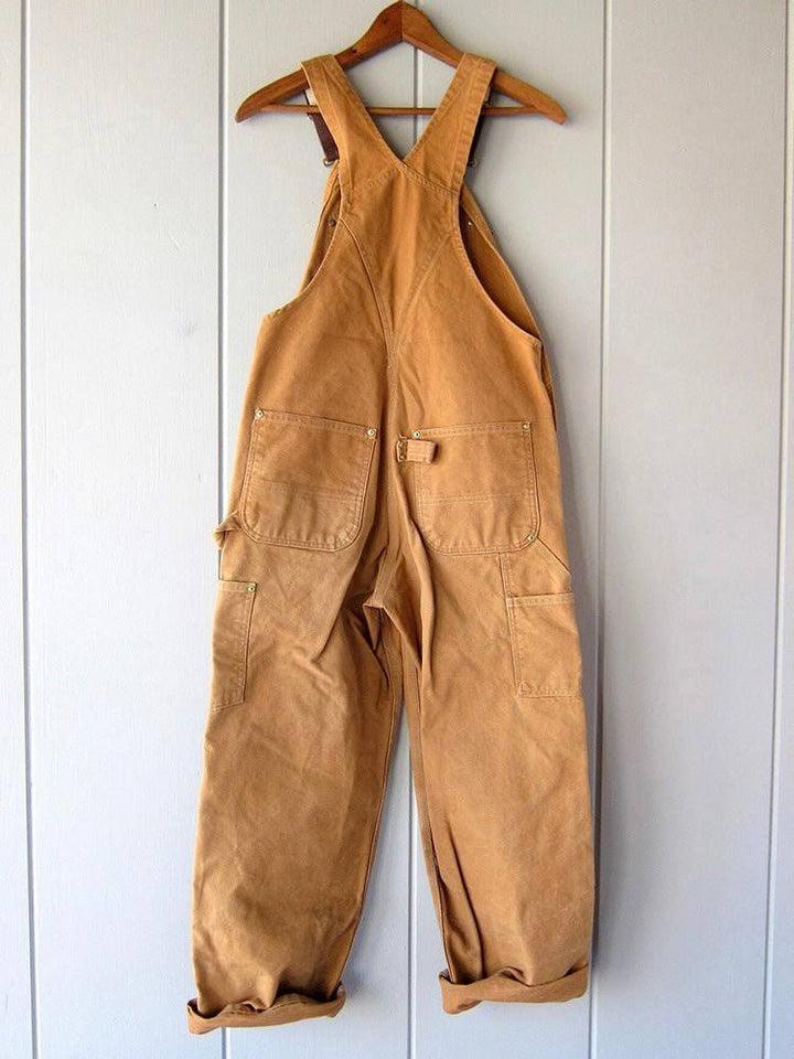 Orange Retro Utility Overalls back view on hanger