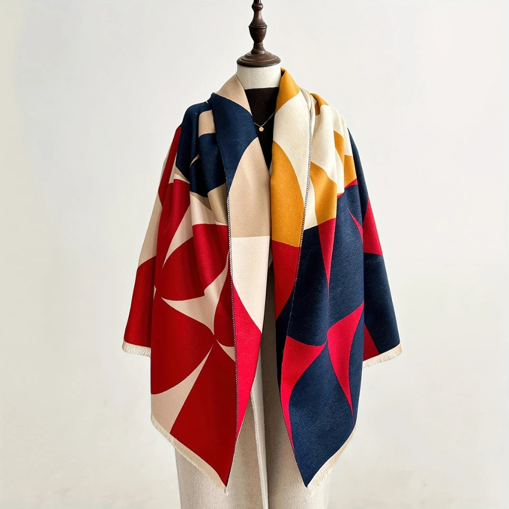 Red and navy Reversible Geometric Poncho Scarf draped on mannequin