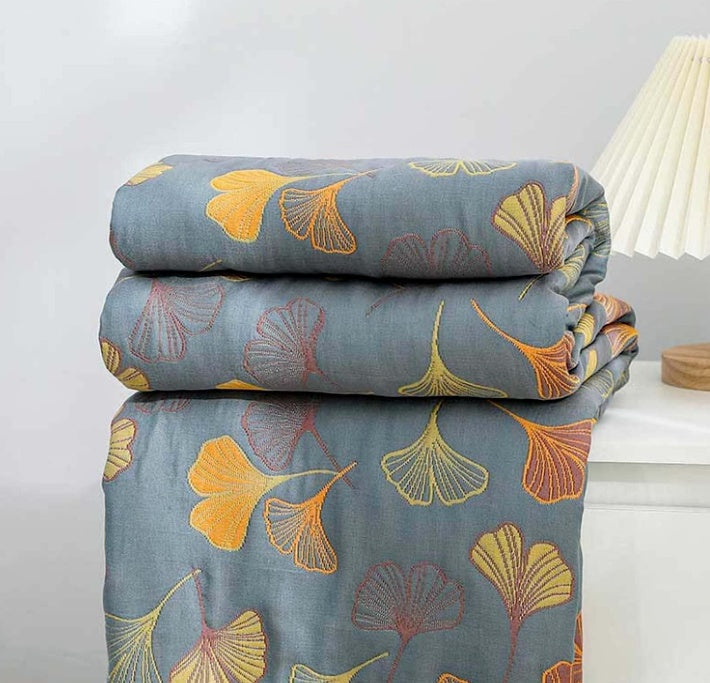 Reversible Ginkgo Cotton Gauze Throw folded and stacked
