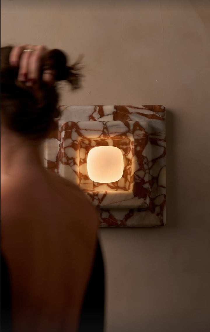 Round Marble Wall Sconce installed on wall