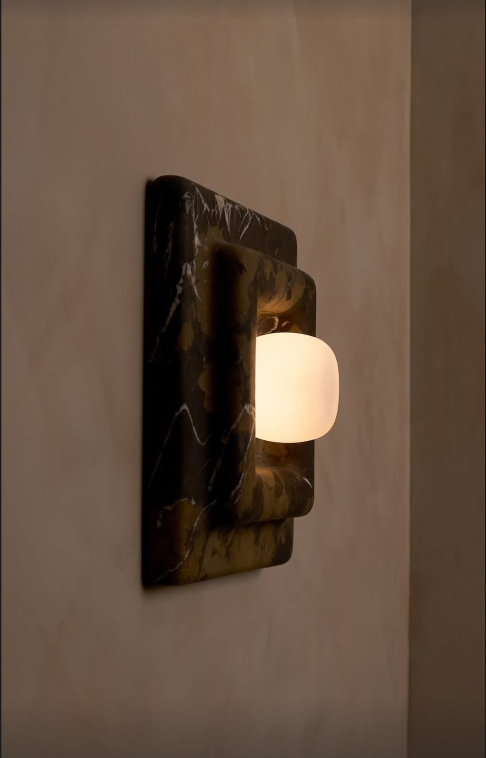 Round Marble Wall Sconce lit glow detail
