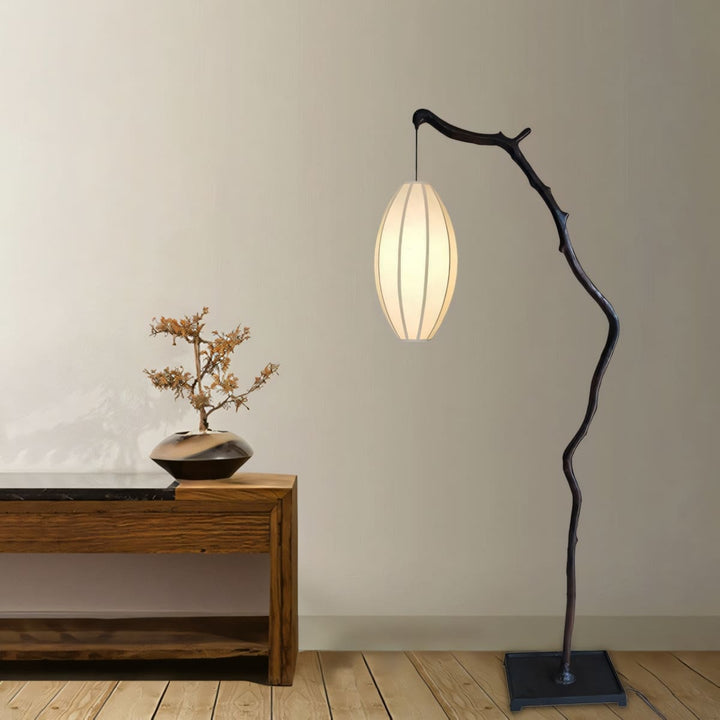 Sculptural Branch Floor Lamp beside console table