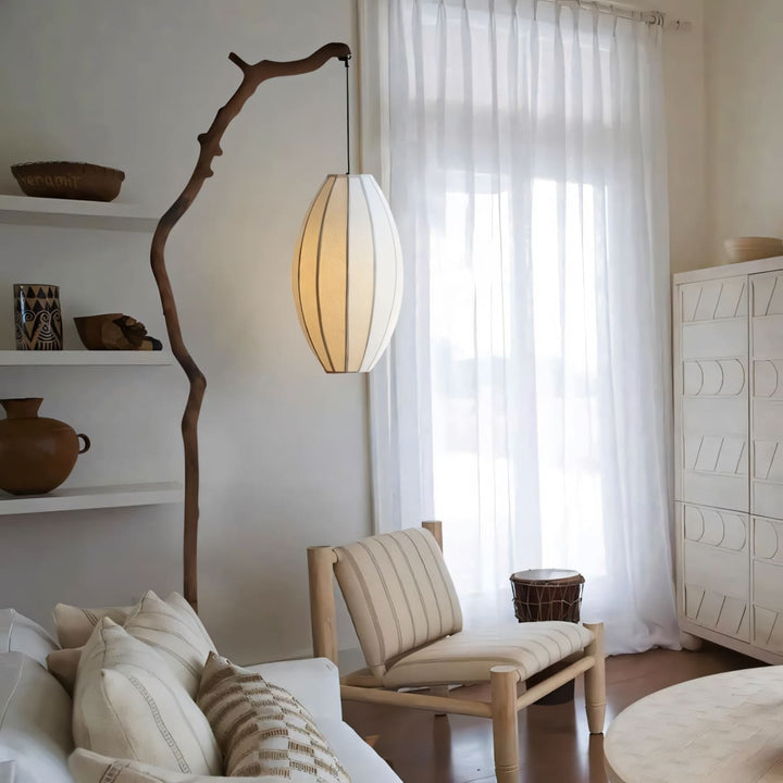 Sculptural Branch Floor Lamp beside lounge chair