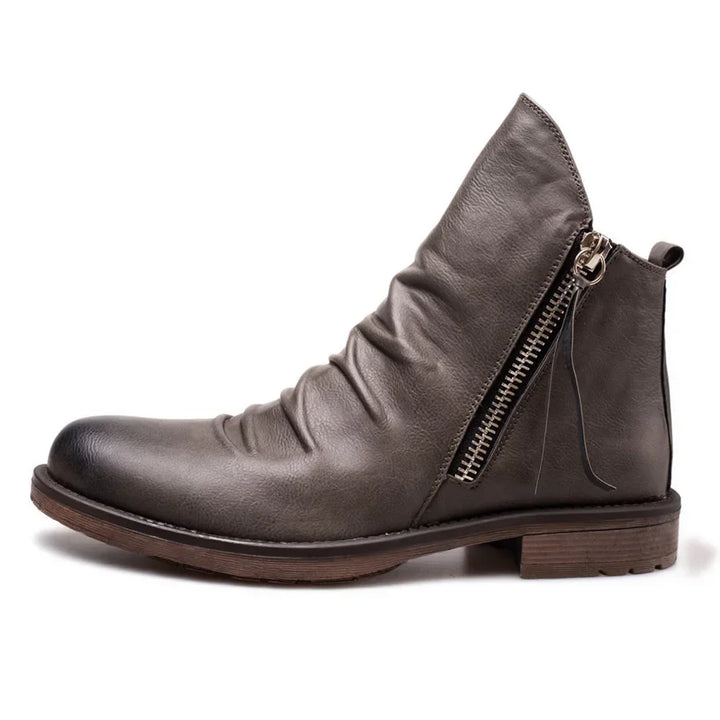 Leather Chelsea boots pair flat lay