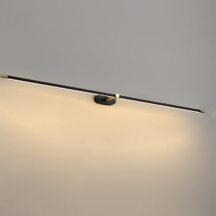 Black and Gold Slim Downlight Vanity Bar lit on wall