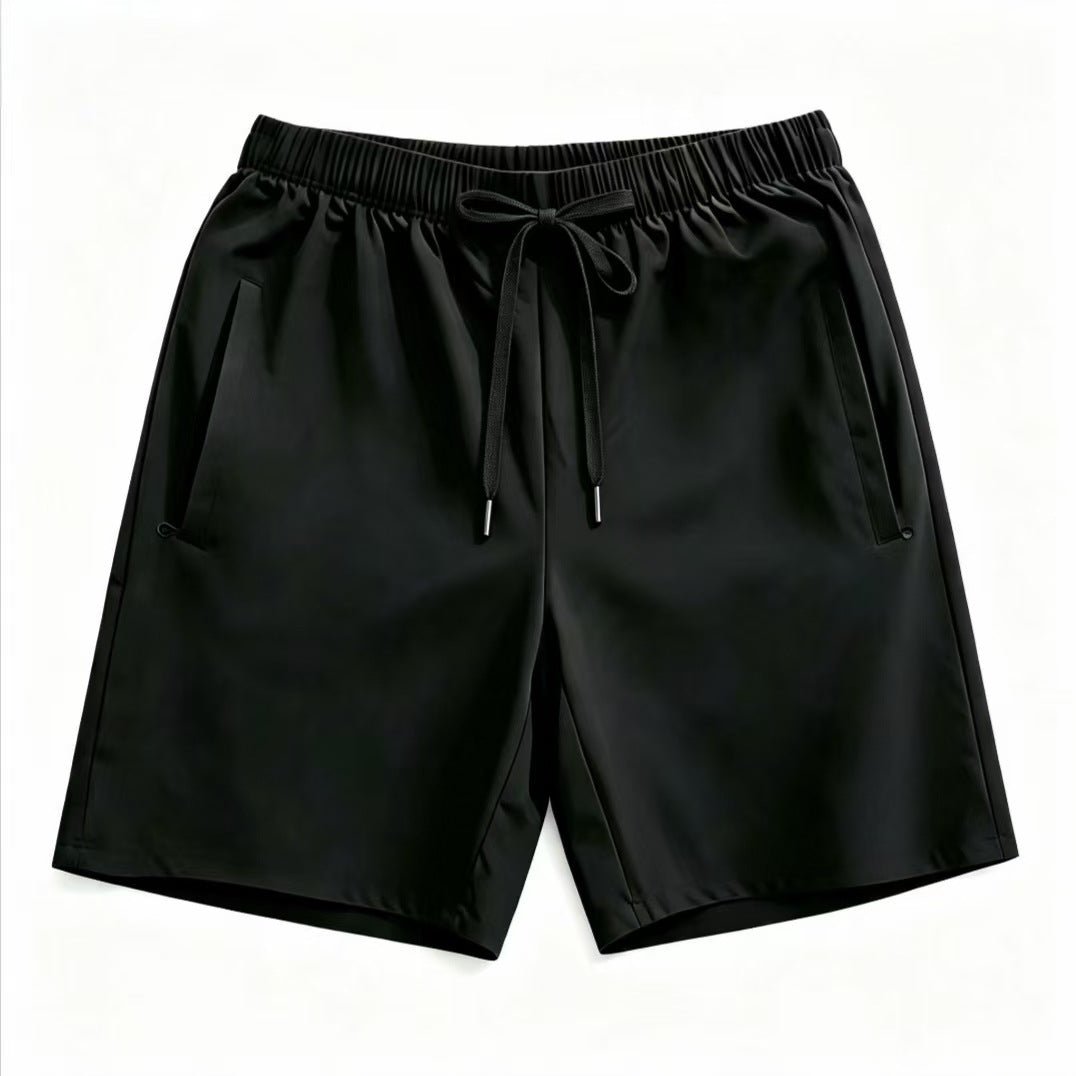 Black drawstring shorts flat lay