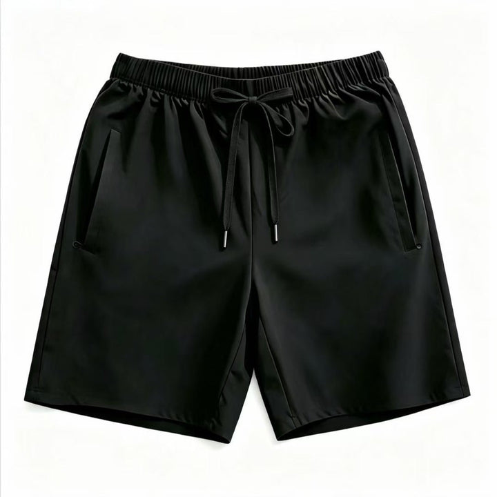 Black drawstring shorts flat lay