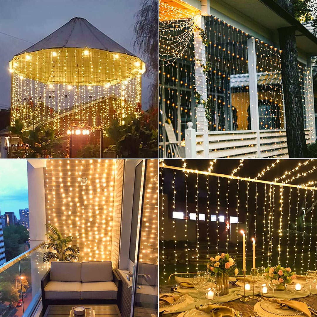 300-LED Solar Curtain Lights lit at night