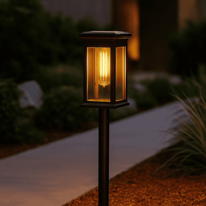 Solar Lantern Garden Stake Light lit beside path at night