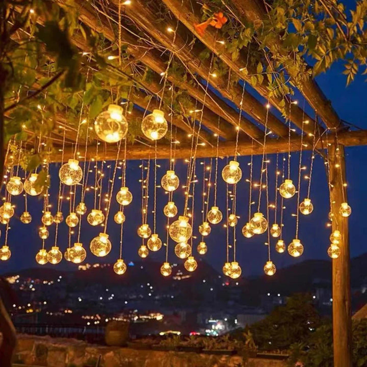Solar Pendant String Lights hung on pergola