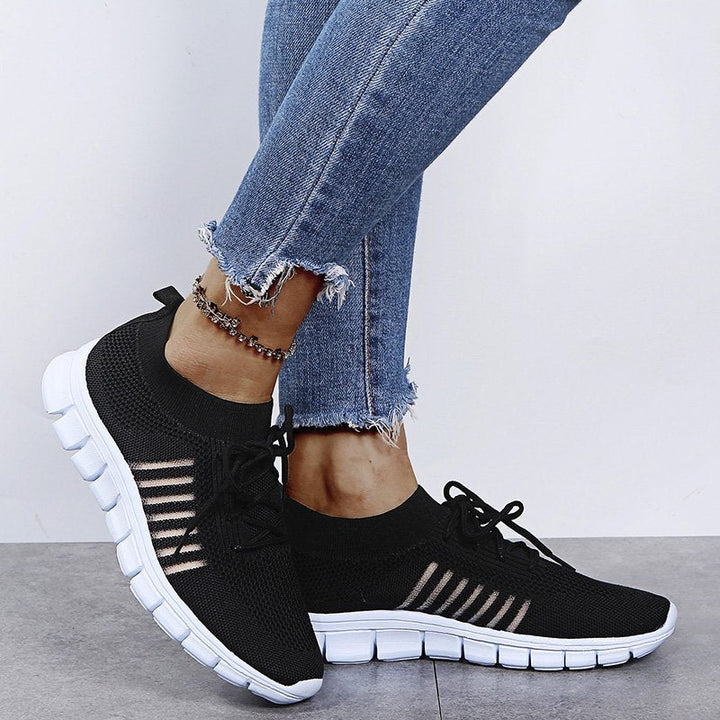 Black Sport-Inspired Slip-On Sneakers on-foot view