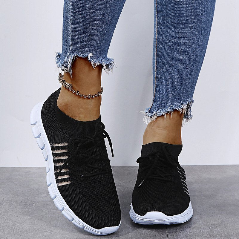 Black Sport-Inspired Slip-On Sneakers on-foot side view