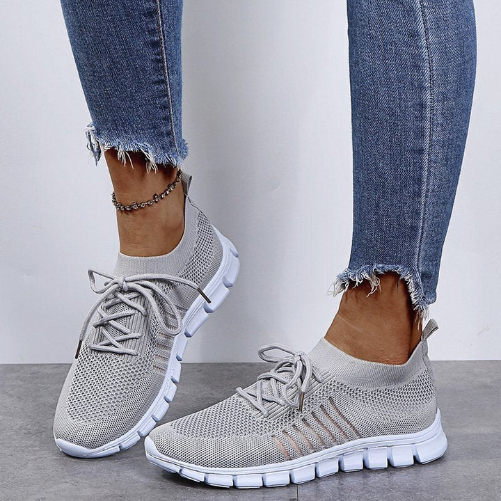 Grey Sport-Inspired Slip-On Sneakers on-foot side view