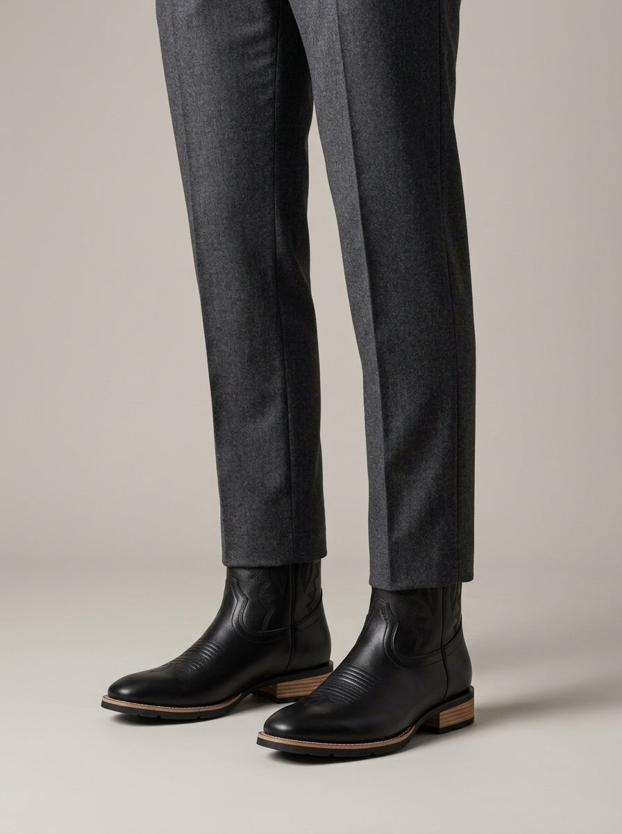 Square-toe Western boots worn with trousers