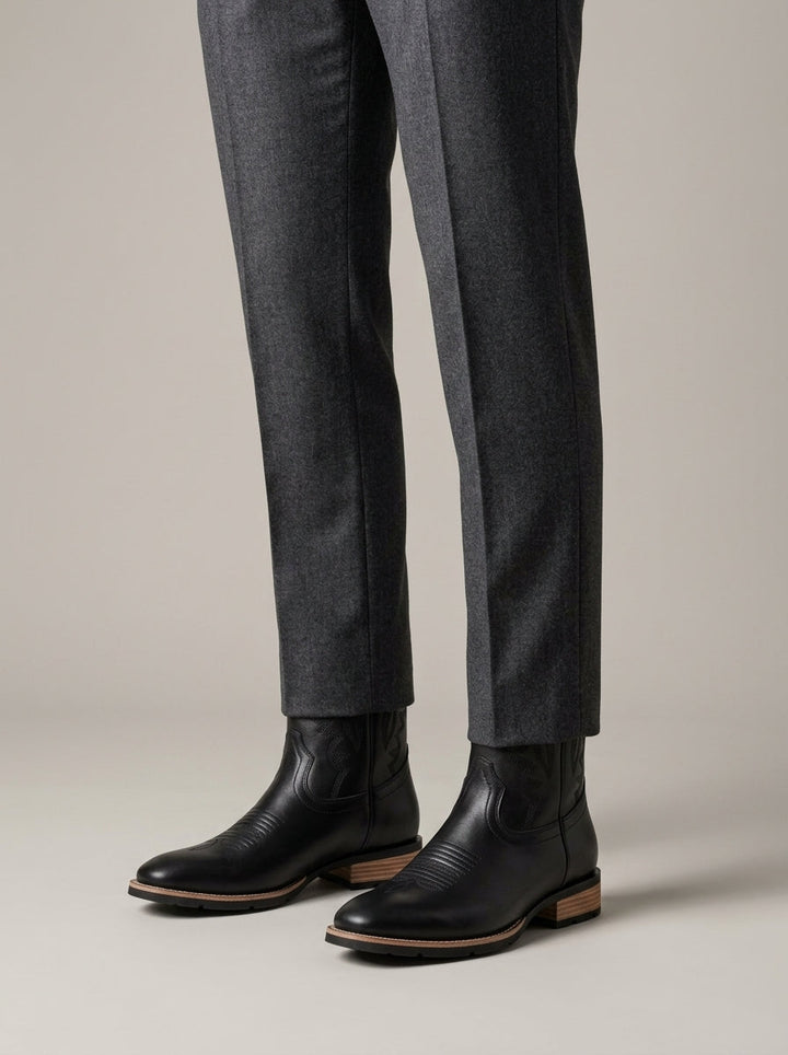 Square-toe Western boots worn with trousers