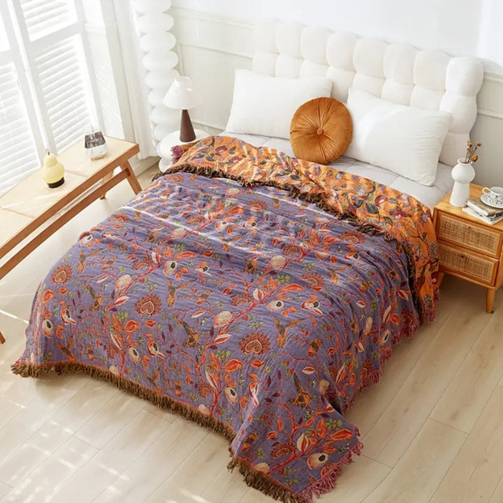 Orchid Bloom Botanical Jacquard Cotton Throw in a bedroom