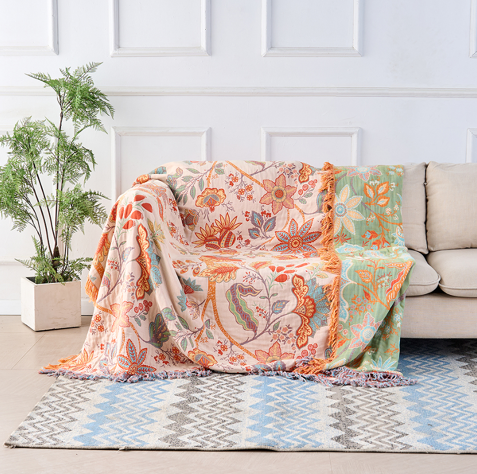 Multicolor floral cotton throw blanket, tassel edge close-up