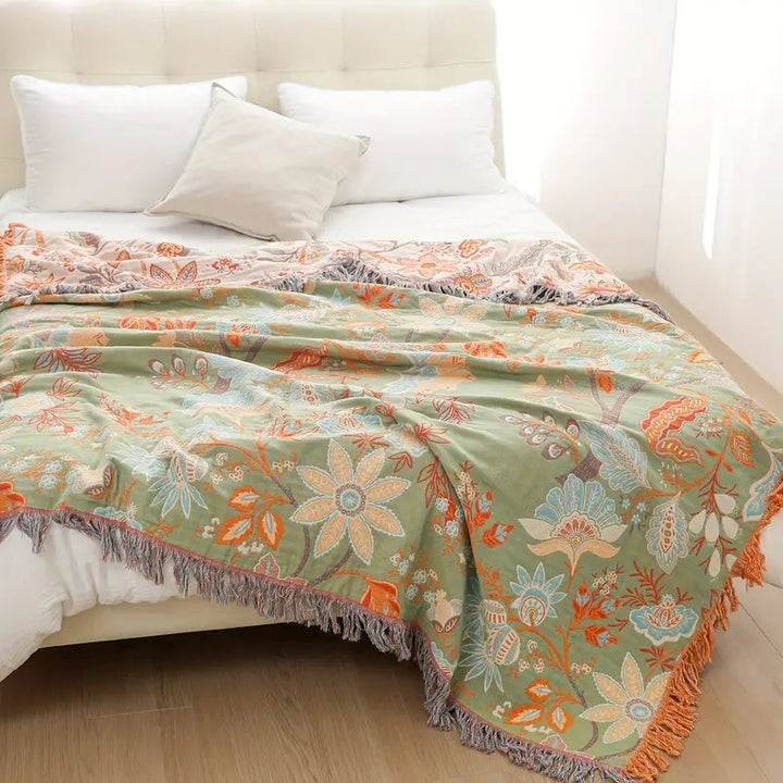 Multicolor floral cotton throw blanket lifestyle shot