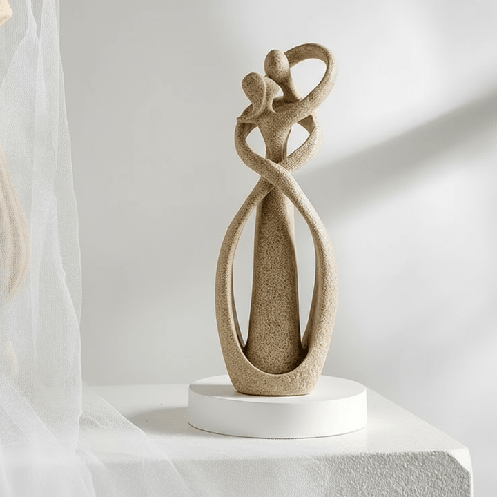 Sand Textured Ceramic Couple Sculpture on round pedestal