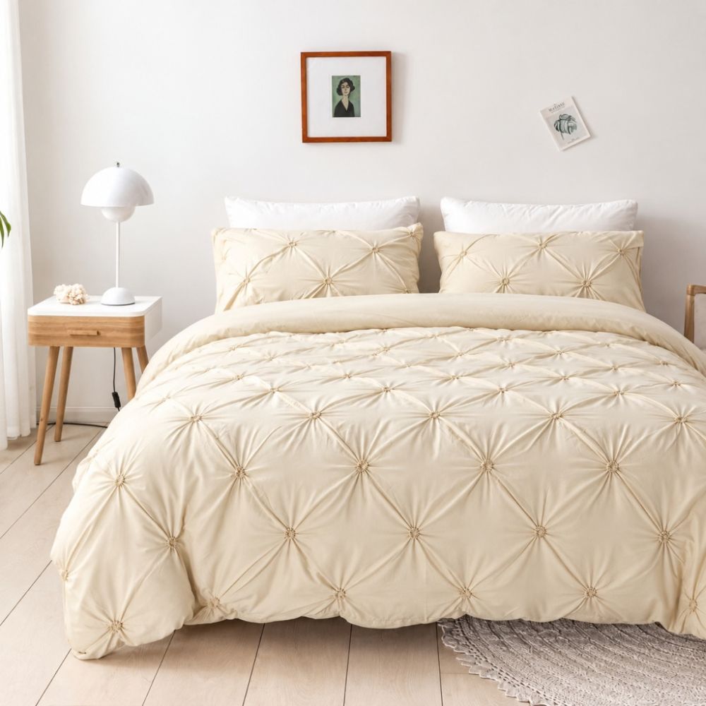 Ivory Cream Textured Diamond Pintuck Duvet Cover Set on bed front view