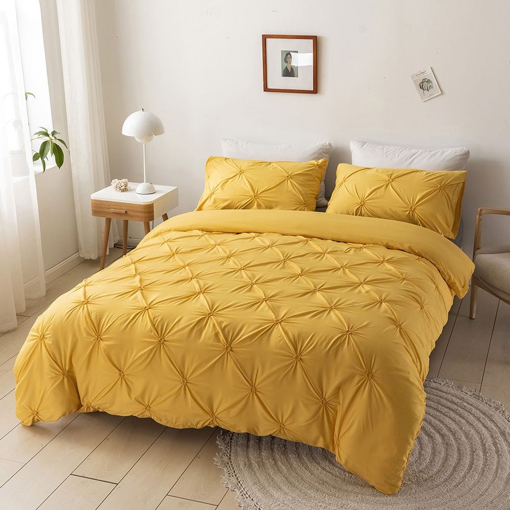 Golden Mustard Textured Diamond Pintuck Duvet Cover Set on bed front view