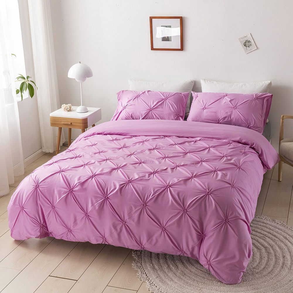 Lavender Pink Textured Diamond Pintuck Duvet Cover Set on bed front view