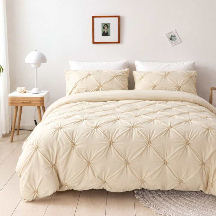 Ivory Cream Pintuck Microfiber Duvet Cover Set on bed front view