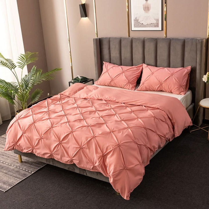 Blush Rose Pintuck Microfiber Duvet Cover Set on bed front view