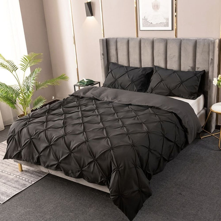 Midnight Black Pintuck Microfiber Duvet Cover Set on bed front view