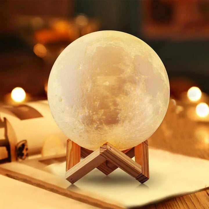 Touch-Dimmable Moon Lamp on wooden stand with warm glow