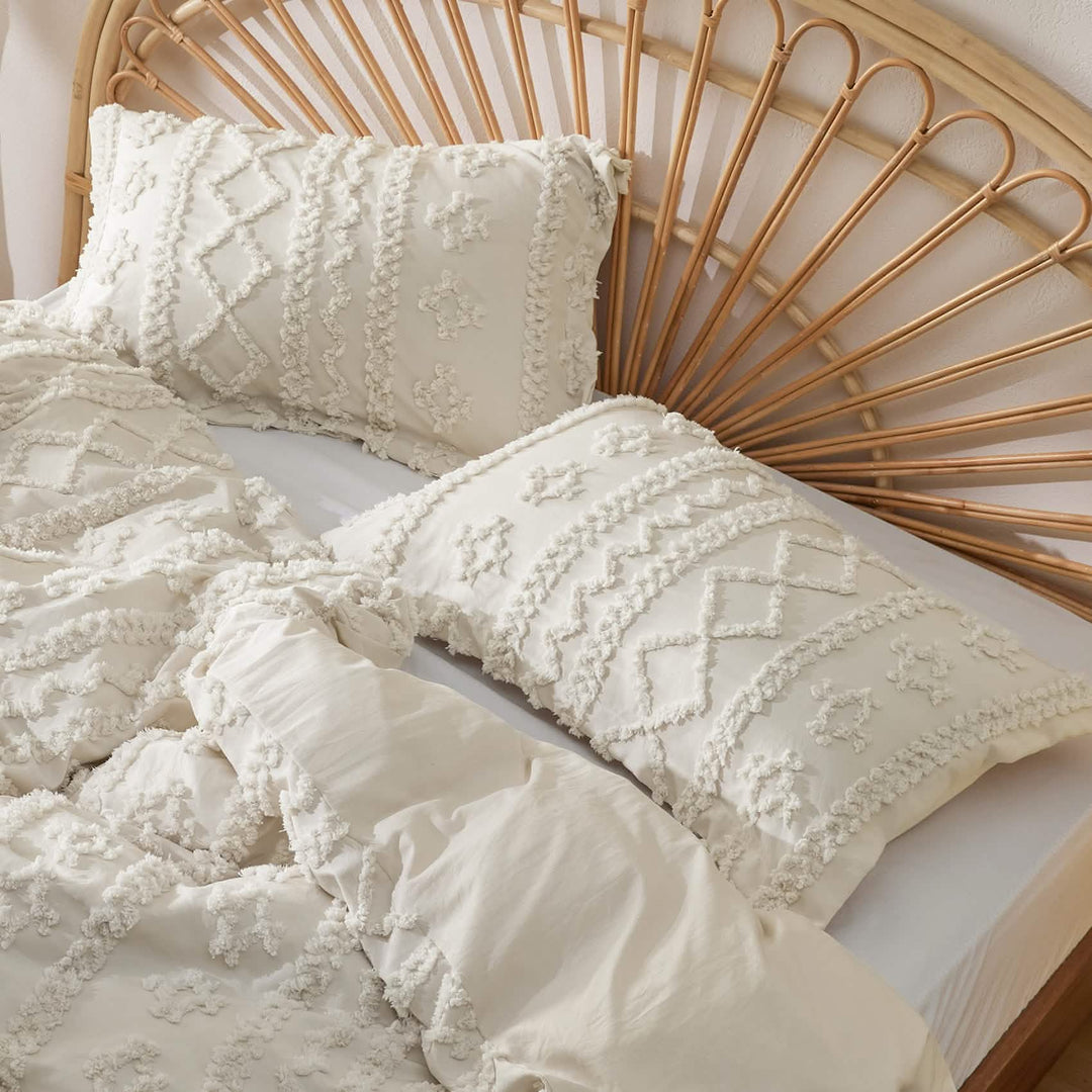 Tufted Boho Duvet Cover Set folded flat lay